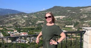 BeckyPom standing on a terrace Cyprus Review Travel